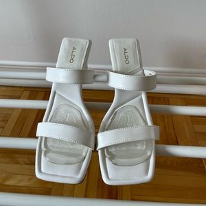 White strappy block heel sandals